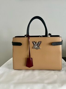 Authentic Louis Vuitton Twist Tote bag in Epi leather with Burgundy Tag